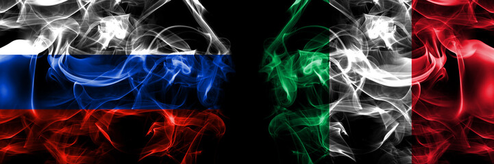 Russia, Russian vs Italy, Italian flags. Smoke flag placed side by side isolated on black background