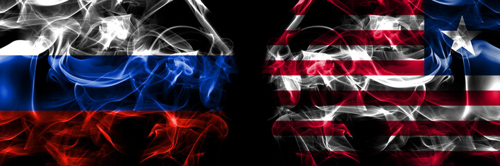 Russia, Russian vs Liberia flags. Smoke flag placed side by side isolated on black background