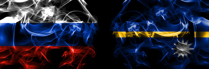 Russia, Russian vs Nauru, Nauruan flags. Smoke flag placed side by side isolated on black background