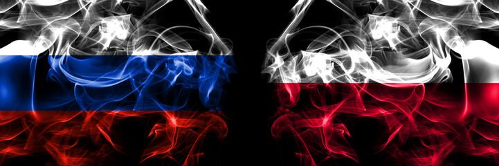 Russia, Russian vs Poland, Polish, Pole flags. Smoke flag placed side by side isolated on black background