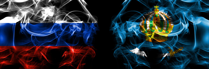 Russia, Russian vs Russia, Astrakhan Oblast flags. Smoke flag placed side by side isolated on black background