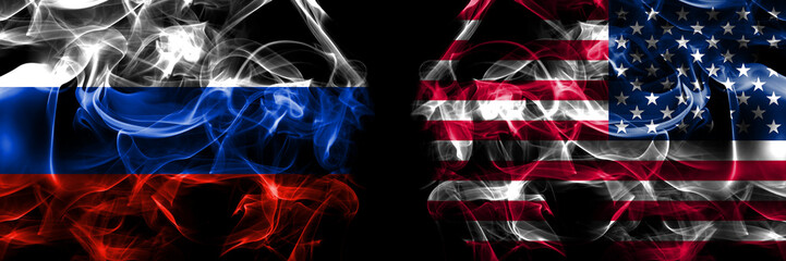 Russia, Russian vs United States of America, America, US, USA, American flags. Smoke flag placed side by side isolated on black background