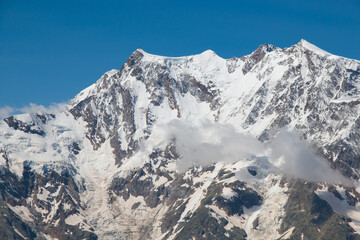 Fototapeta na wymiar Panoramic view of the east peak of Monte Rosa with snow during summer season, Italy