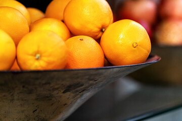 Close up of oranges fruit for sale in grocery store.