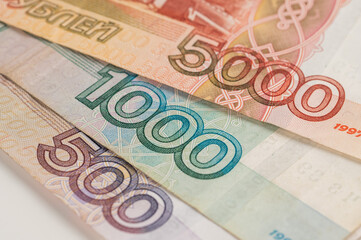 Close-up of banknotes. Five thousand, one thousand, five hundred rubles.