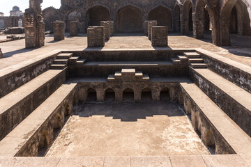 Mandav Group of Monuments. Champa Baoli is part of Mandu historical monument located next to Hindola mahal. It is a step well constructed in Turkish bath style.