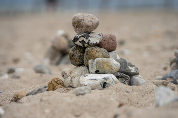 Fototapeta na wymiar stack of stones at the beach