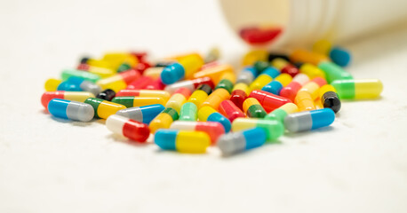 colorful capsule pills on white background