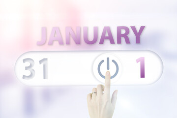 January 1st . Day 1 of month, Calendar date.Hand finger switches pointing calendar date on sunlight office background. Winter month, day of the year concept.