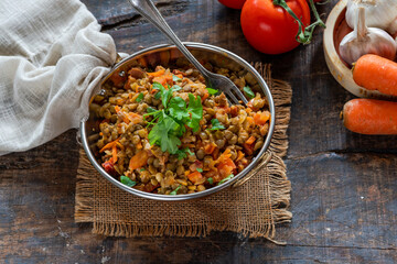 Green lentils stew with white wine, Serrano ham and smoked paprika