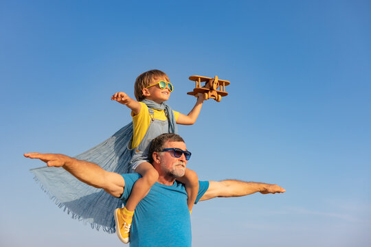 Grandfather and boy having fun outdoor