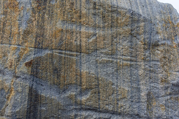 The surface of the andesite rock. Natural stone texture