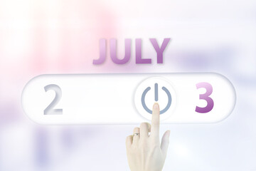 July 3rd. Day 3 of month, Calendar date.Hand finger switches pointing calendar date on sunlight office background. Summer month, day of the year concept.