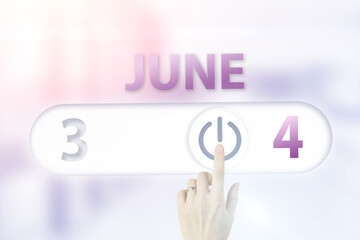 June 4th. Day 4 of month, Calendar date.Hand finger switches pointing calendar date on sunlight office background. Summer month, day of the year concept.