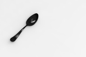 Spoon is black on gray background. Isolated object. perspective view. Horizontal image. 3D image. 3D rendering.