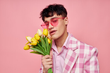 pretty man fashionable pink sunglasses jacket posing pink background unaltered