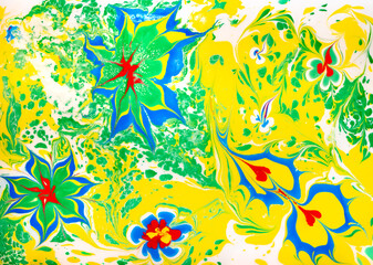 Fototapeta na wymiar Drawing in the ebru technique without a sketch, painting on water, abstract drawing, beautiful pattern..Abstract marbling colorful background.