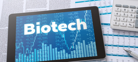 A tablet with financial documents - Biotech