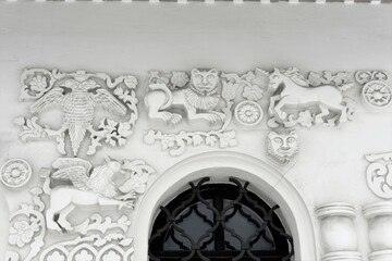 Russia, St. Petersburg, January 2022. A fragment of the wall of the cathedral with stucco decorations in the Russian style.