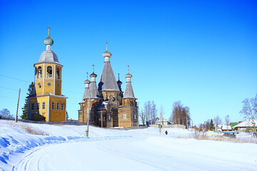 wooden church in the Russian north landscape in winter, architecture historical religion Christianity