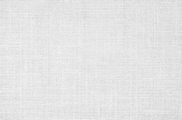 Fototapeta na wymiar White fabric jute hessian sackcloth canvas woven gauze texture pattern. Natural linen, cotton cloth ackground empty for decoration.