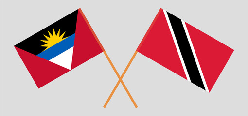 Crossed flags of Antigua and Barbuda and Trinidad and Tobago. Official colors. Correct proportion
