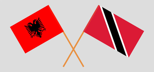Crossed flags of Albania and Trinidad and Tobago. Official colors. Correct proportion