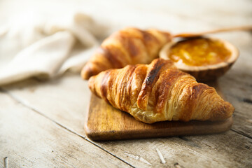 Homemade croissants with orange marmalade