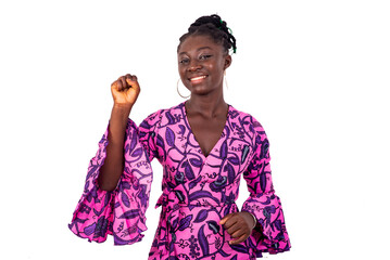 portrait of a beautiful happy african woman showing victory gesture.