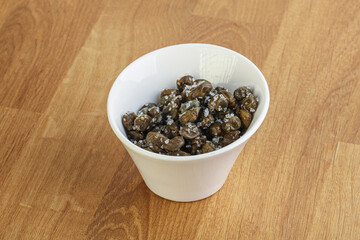 Salted marinated capers snack appetiser