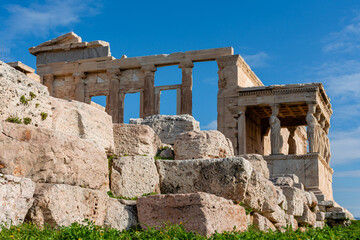 Fototapeta na wymiar Ancient temple of the Acropolis Erechtheion in Athens, antique architecture, cityscape