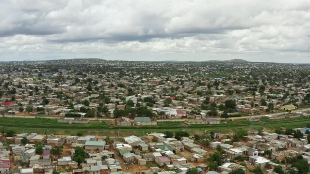 Aerial view cityscape of Lusaka Zambia. Architecture of a city in Africa with the streets of private houses in the green trees.