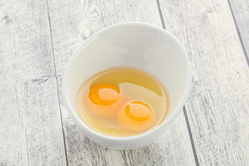 Chicken egg in the bowl