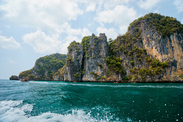 Vacation on island. Beautiful landscape with sea, boat and rocks.