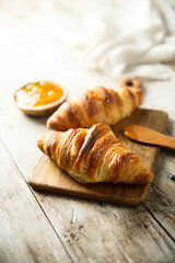 Homemade croissants with orange marmalade