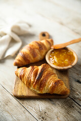Homemade croissants with orange marmalade