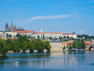 Fototapeta premium The Vitava and the St. Vitus Cathedral in Prague, Czech republic