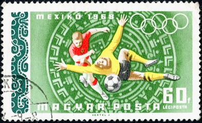 HUNGARY - CIRCA 1968: A post stamp printed in Hungary shows soccer players