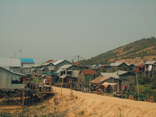Floating village and boat on Tonlé Sap lake in Cambodia