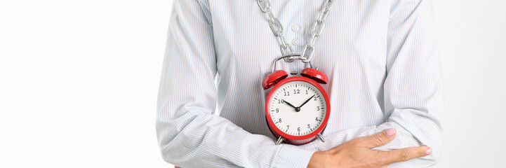Chain with red alarm clock weighs on woman neck