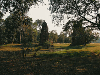 Ruins of an ancient stone temple lost in the Cambodian jungle - Prasat Suor Prat of Angkor temples