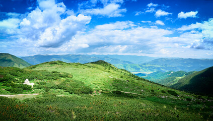 Beautiful mountains landscape with green meadow. Carpathians, Ukraine.
