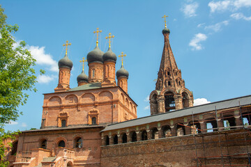 Red brick Dormition Cathedral in the Krutitsy Patriarchal Metochion ecclesiastical estate built in 1600’s in Tagansky District of Moscow, Russia

