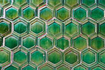 Green tile texture background.