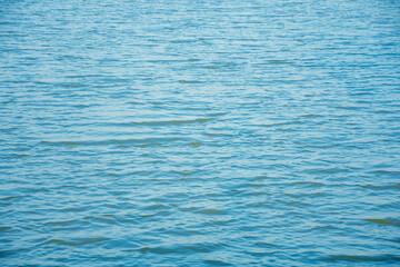 The surface of the water is blue in the evening.