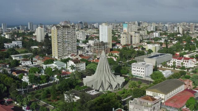 Aerial view Maputo Mozambique. Cityscape Christian church in the city center with tall buildings and new architecture.