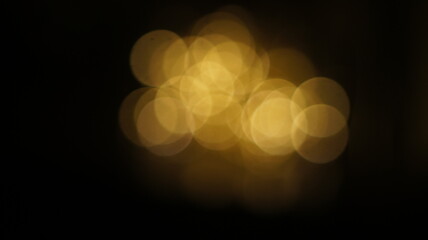 Golden bokeh crystal abstract light rays background, shiny flare texture photo overlay optical lens prism reflection. Use screen overlay mode.