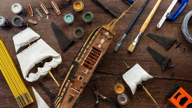 Model Ship Building handcraft on table with different materials