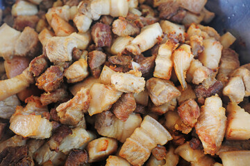 The meat pieces piled up after cooking and frying, emitting an attractive taste