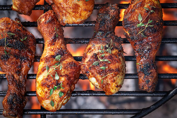 Hot roasted chicken leg with spicy spices and herbs.